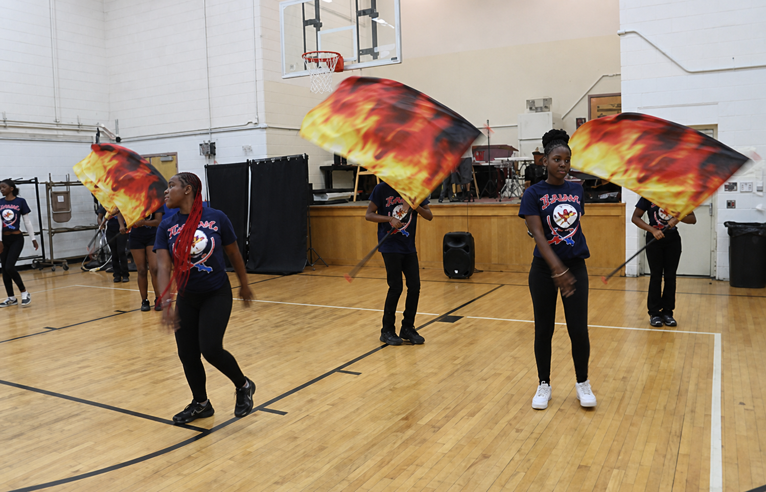 Young people performing together at a community event