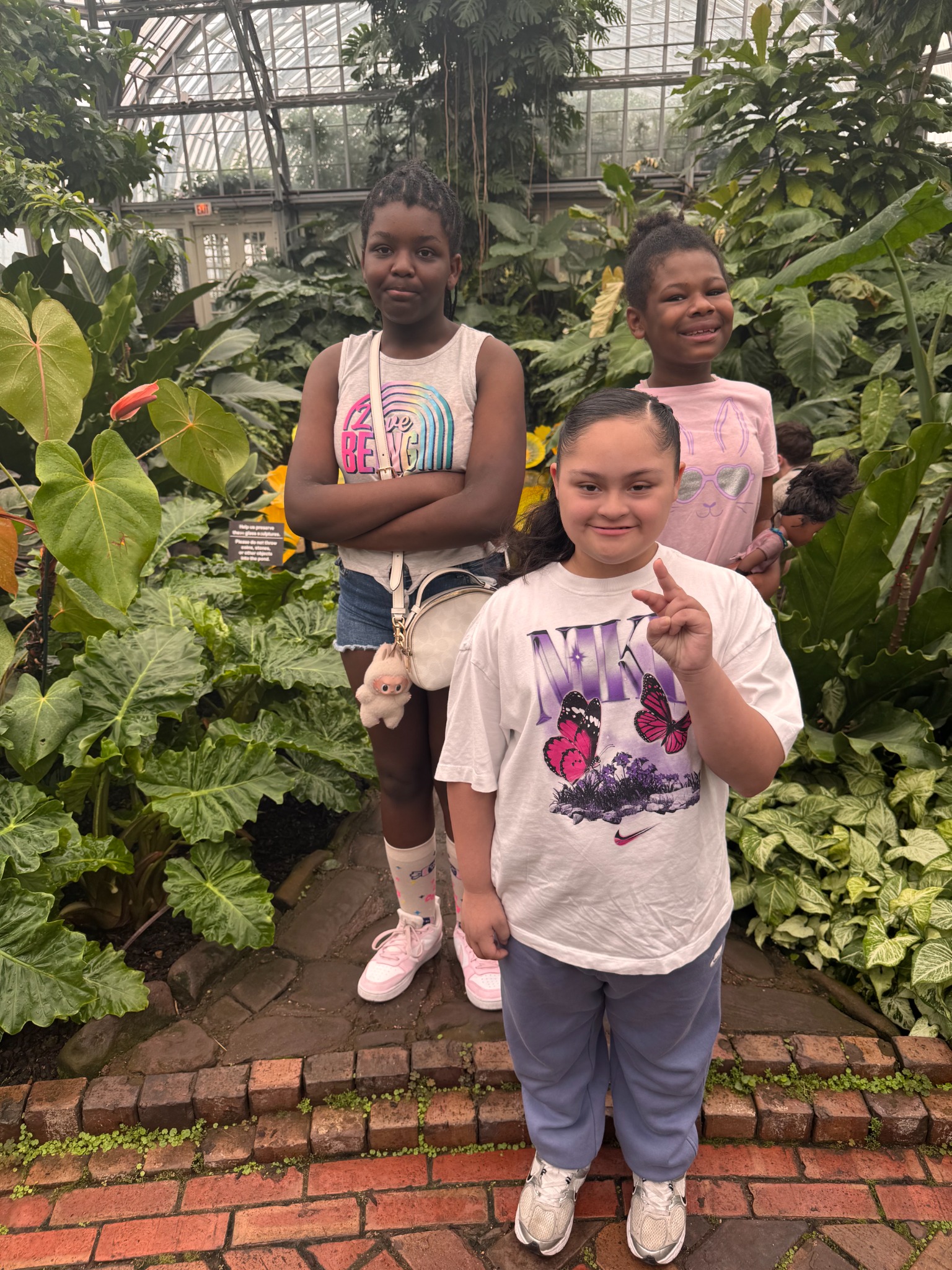 Young people learning in an East Garfield Park community garden