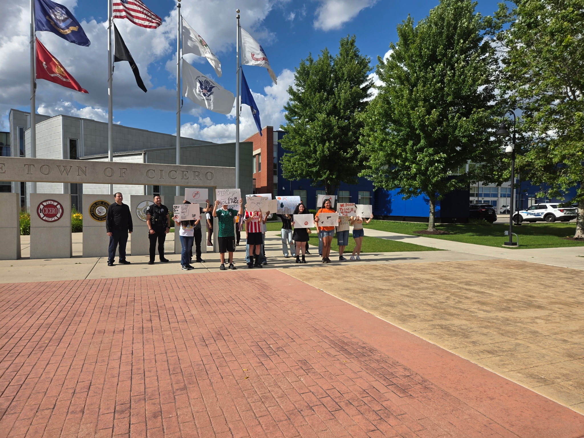 Young people leading a peace march outside Cicero Town Hall